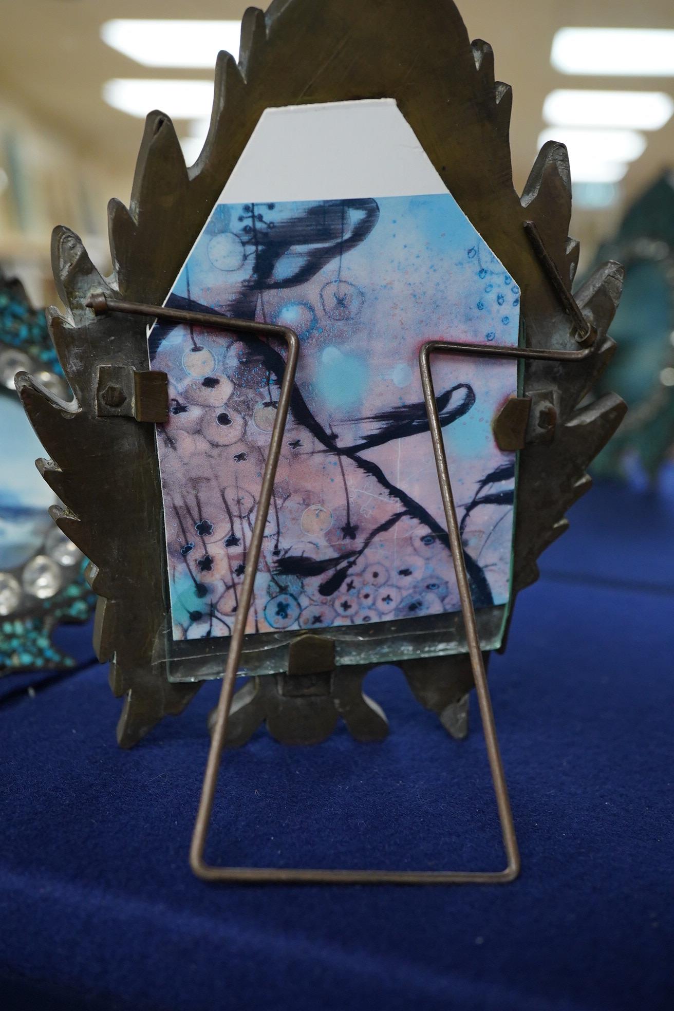 Two miniature turquoise inlaid easel frames and a similar box, largest 18cm high